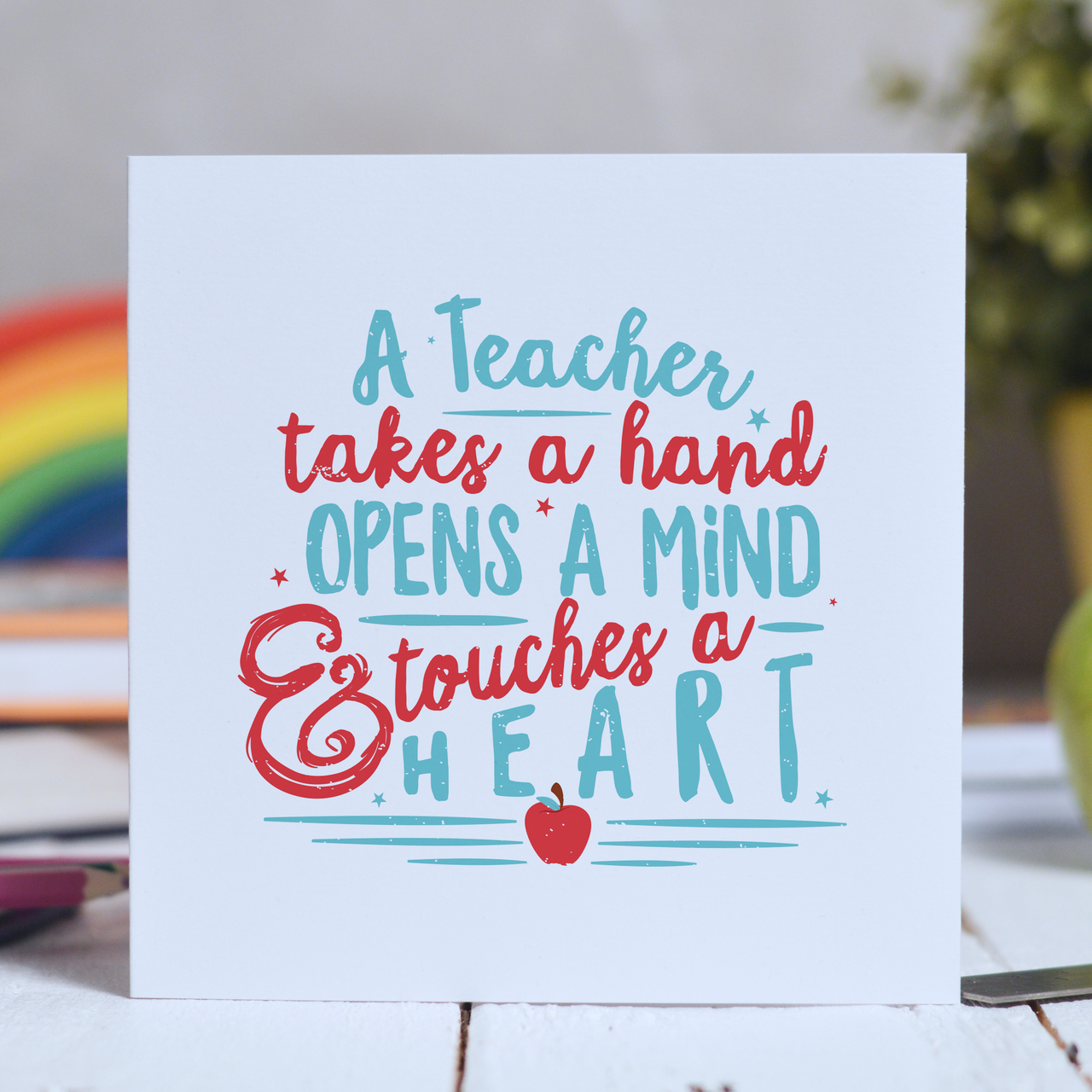 A Teacher takes a hand Card